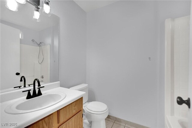 full bath with vanity, tile patterned floors, toilet, and  shower combination