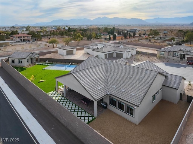 birds eye view of property featuring a residential view and a mountain view