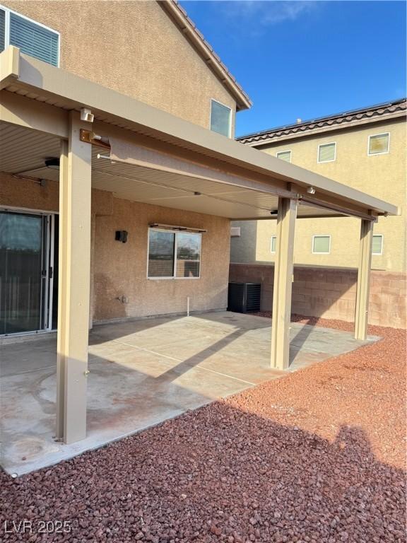 view of patio with central AC unit