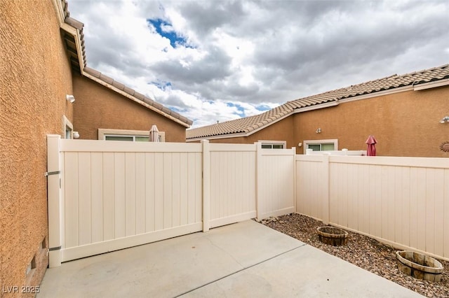 view of patio with a fenced backyard