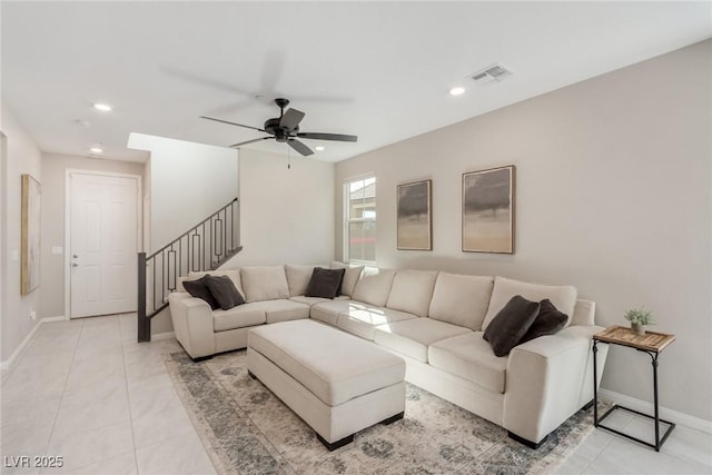 living room with stairway, baseboards, visible vents, recessed lighting, and ceiling fan