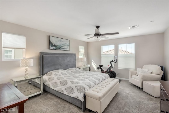 bedroom featuring visible vents, ceiling fan, baseboards, and carpet