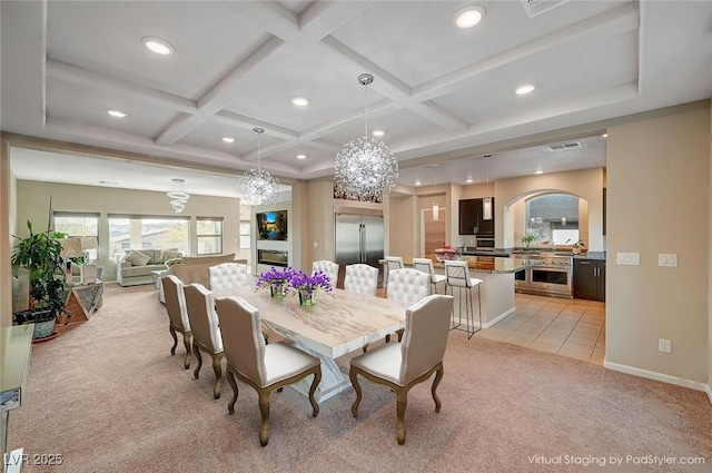 dining area featuring a notable chandelier, recessed lighting, coffered ceiling, and light carpet