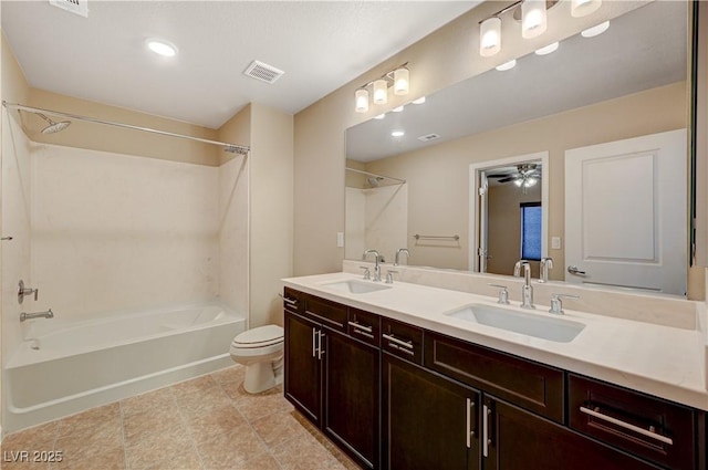 full bathroom with visible vents, toilet, shower / bath combination, and a sink