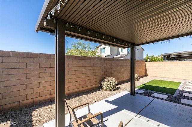 view of patio / terrace with a fenced backyard