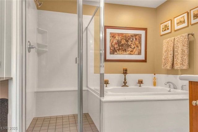 64 Strada Principale Unit 307, Henderson, NV 89011 - bathroom featuring a garden tub, a shower stall, and tile patterned flooring