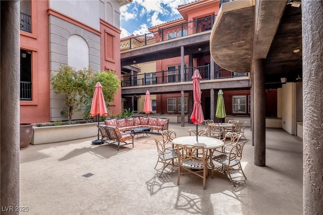 view of patio / terrace featuring outdoor lounge area and outdoor dining area