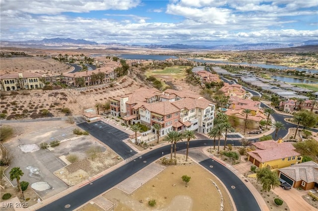 bird's eye view featuring a water and mountain view