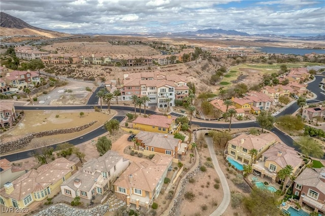 bird's eye view with a residential view and a mountain view