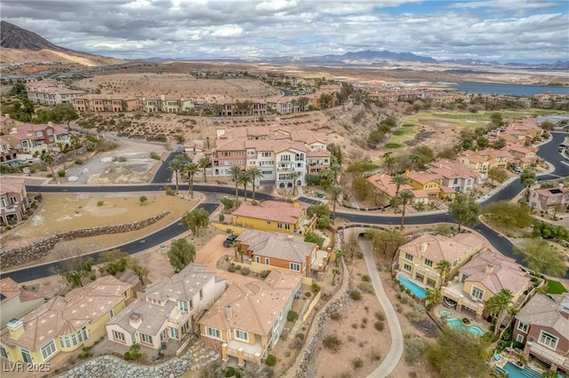 64 Strada Principale Unit 307, Henderson, NV 89011 - aerial overview of property's location with nearby suburban area and a water and mountain view
