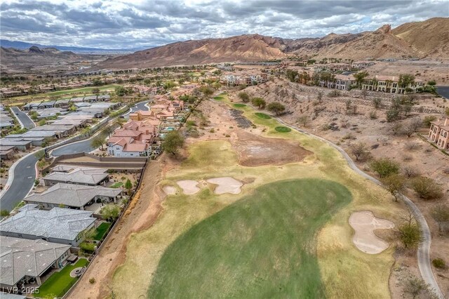 birds eye view of property with a mountain view and a residential view