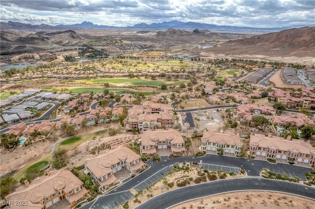 drone / aerial view with a mountain view and a residential view