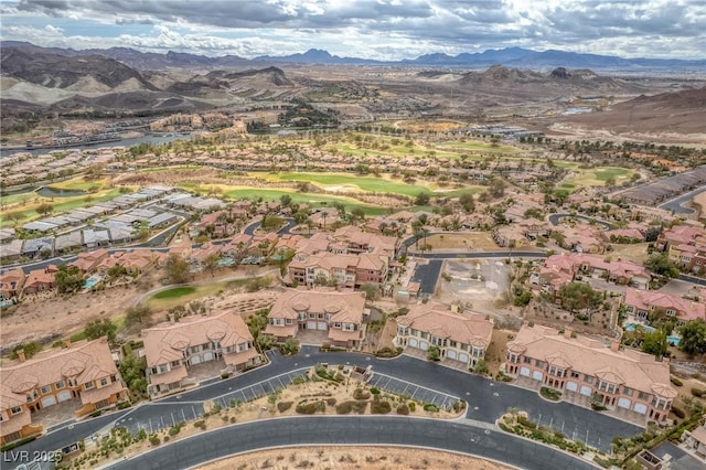 drone / aerial view with a residential view and a mountain view