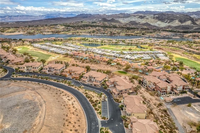 aerial view with a residential view and a water and mountain view