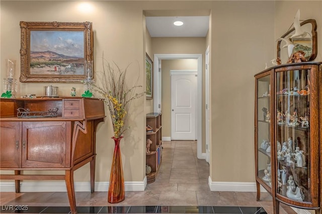 64 Strada Principale Unit 307, Henderson, NV 89011 - corridor with baseboards and tile patterned floors