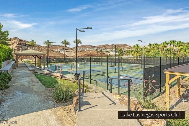64 Strada Principale Unit 307, Henderson, NV 89011 - view of tennis court featuring a gazebo and a mountain view