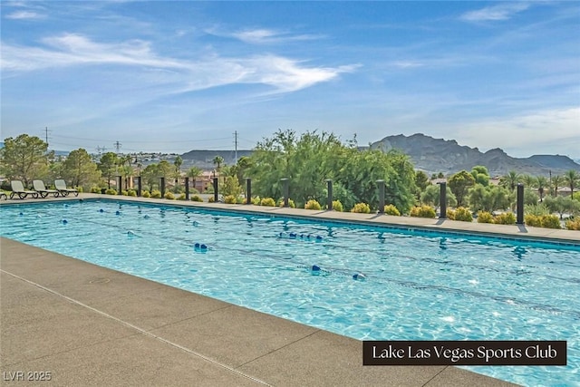 64 Strada Principale Unit 307, Henderson, NV 89011 - community pool featuring a mountain view