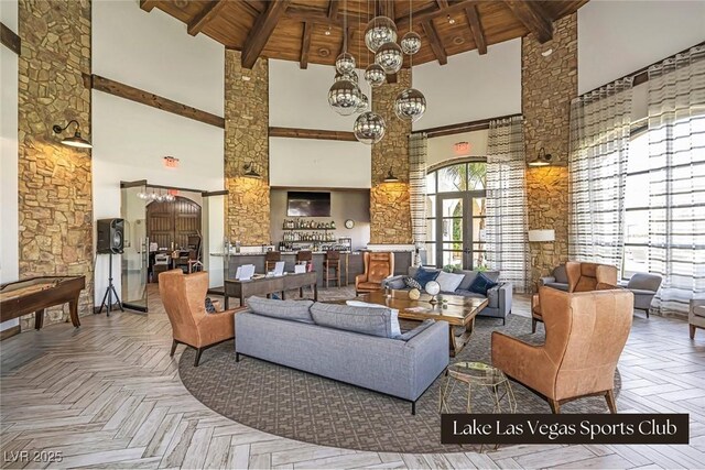 64 Strada Principale Unit 307, Henderson, NV 89011 - building lobby with a towering ceiling and wooden ceiling with exposed beams