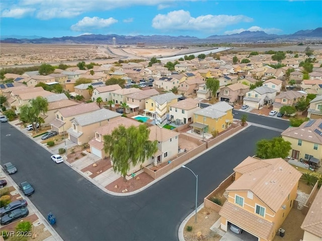 drone / aerial view with a mountain view and a residential view