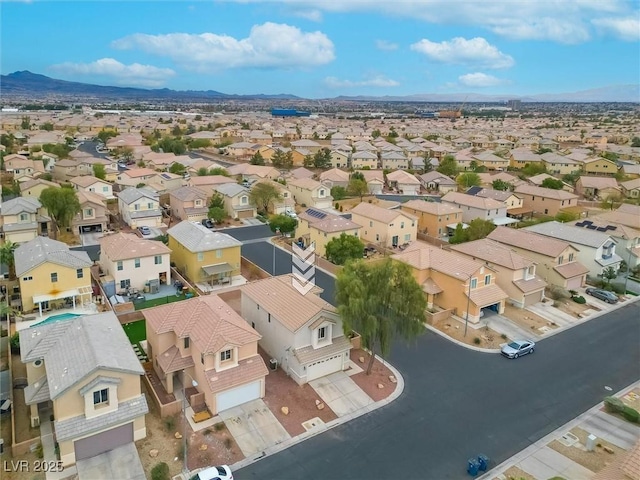 birds eye view of property with a residential view