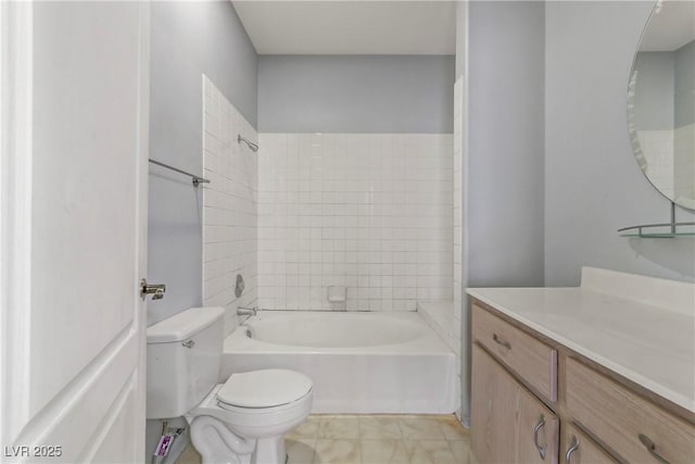 bathroom with shower / bathing tub combination, toilet, and vanity