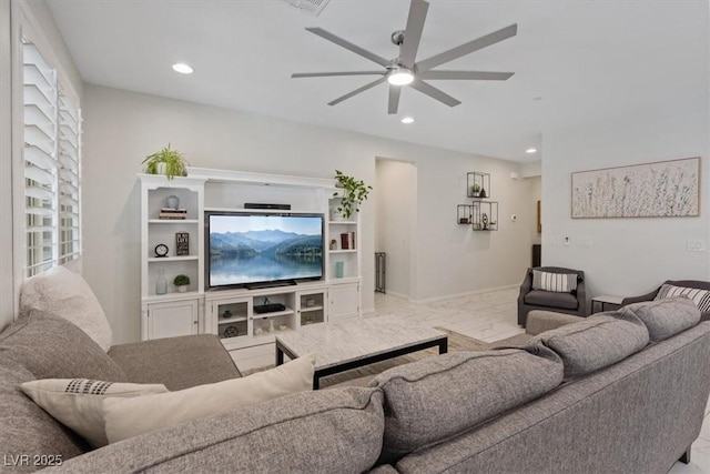 living area with visible vents, baseboards, ceiling fan, recessed lighting, and marble finish floor