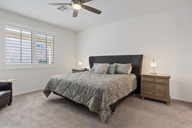 bedroom featuring a ceiling fan, baseboards, visible vents, and light carpet