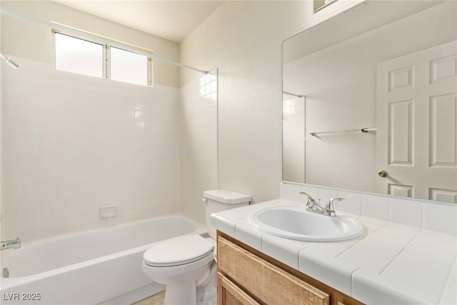 full bath with toilet, vanity, and bathtub / shower combination