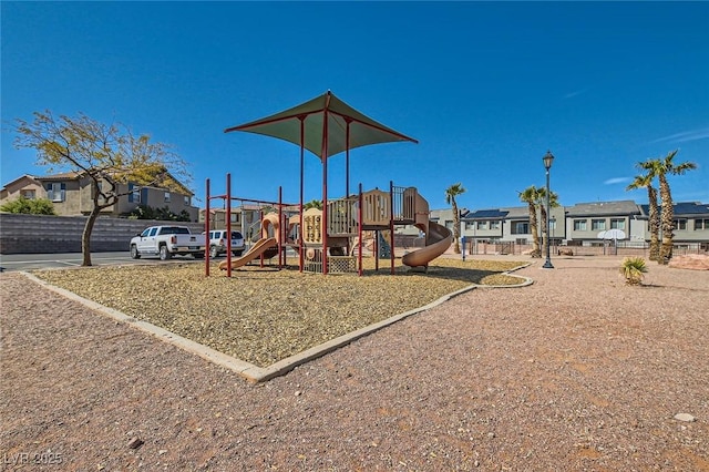 communal playground with a residential view