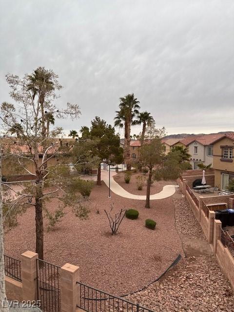 view of property's community with fence