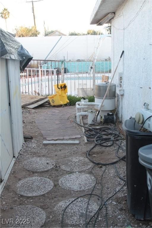 view of patio featuring fence