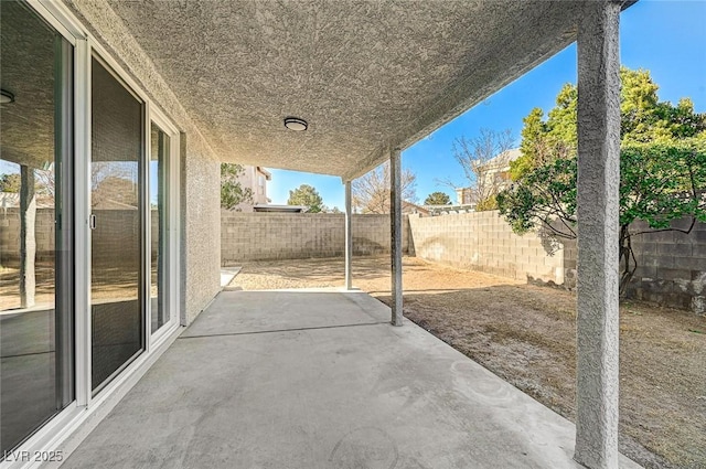 view of patio with a fenced backyard