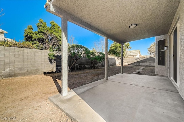 view of patio with a fenced backyard