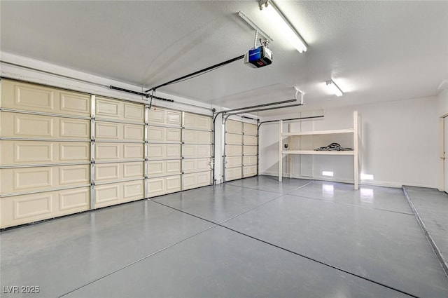 garage featuring baseboards and a garage door opener