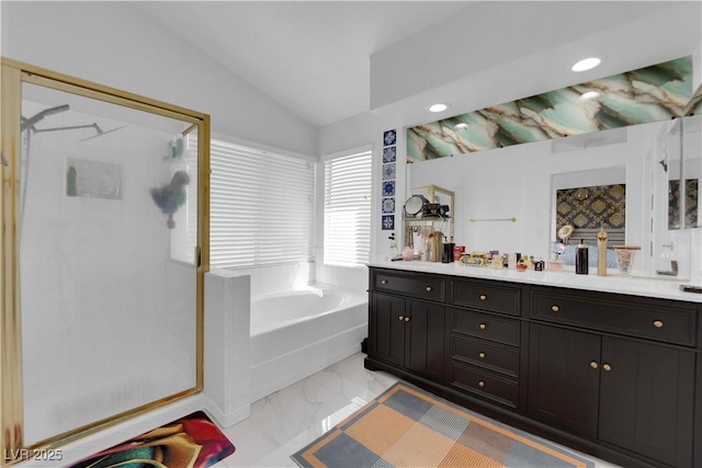 full bath featuring double vanity, a stall shower, vaulted ceiling, a bath, and marble finish floor