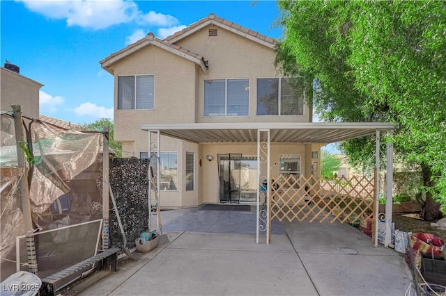 view of patio / terrace with fence