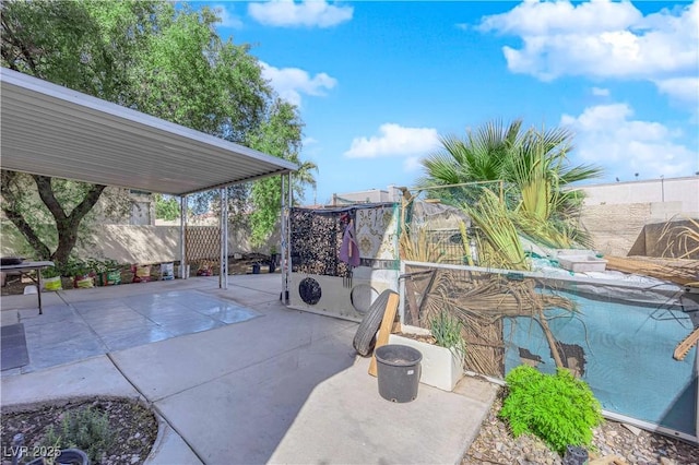 view of patio with fence