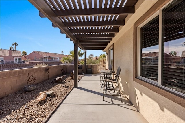 view of patio with a fenced backyard and a pergola