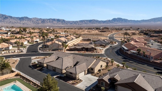 aerial view featuring a mountain view and a residential view