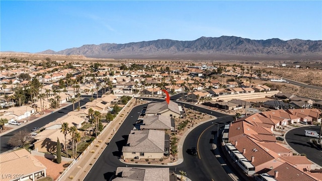 bird's eye view featuring a mountain view and a residential view