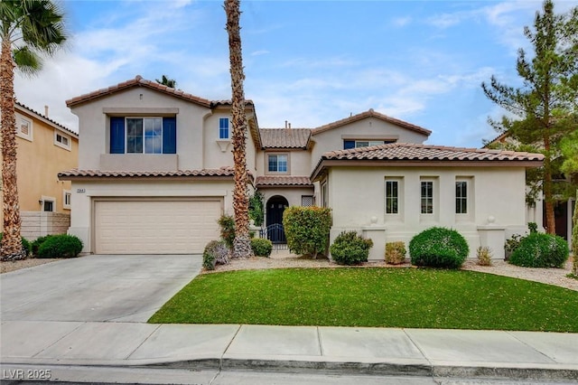 mediterranean / spanish house with a tiled roof, stucco siding, driveway, and an attached garage