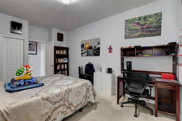 bedroom featuring light colored carpet