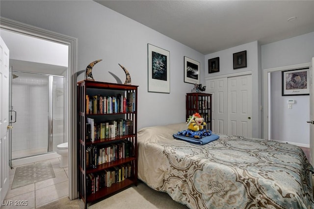 tiled bedroom with connected bathroom