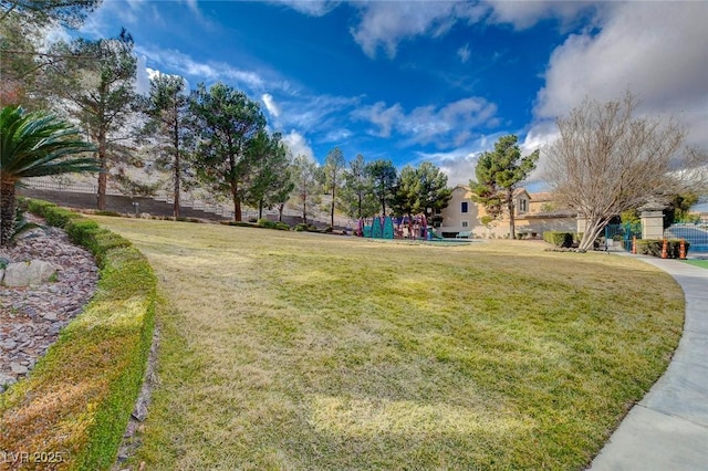 view of yard featuring playground community