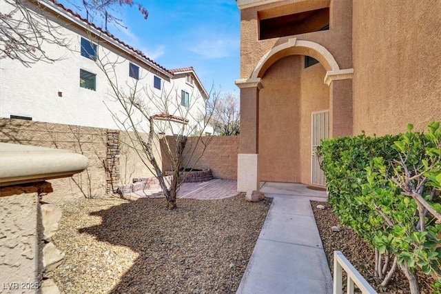 view of yard featuring a patio area and fence