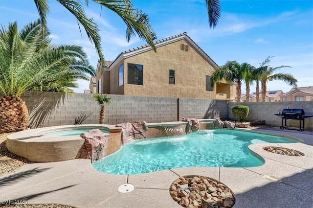 view of pool featuring grilling area, a fenced in pool, an in ground hot tub, and a fenced backyard