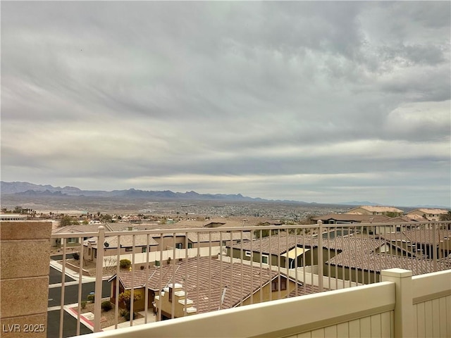 exterior space with a mountain view and a residential view