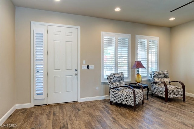 foyer entrance featuring recessed lighting, baseboards, and wood finished floors