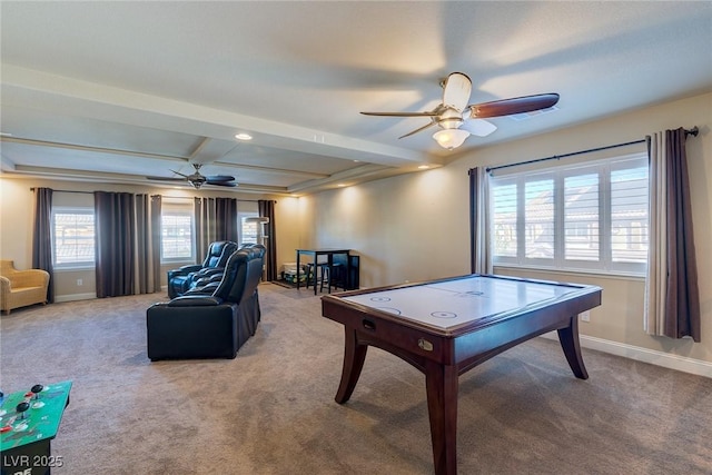 recreation room featuring baseboards, carpet floors, beamed ceiling, and a ceiling fan