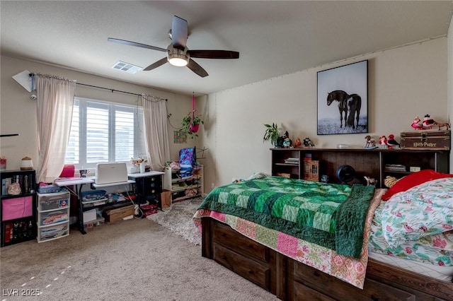 carpeted bedroom featuring visible vents and ceiling fan